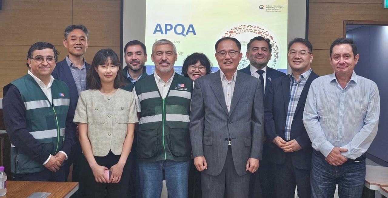 Delegacion chilena con el APQA